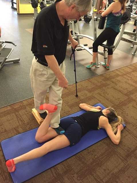 The Rossiter System being performed on a client to help alieviate hamstring pain.